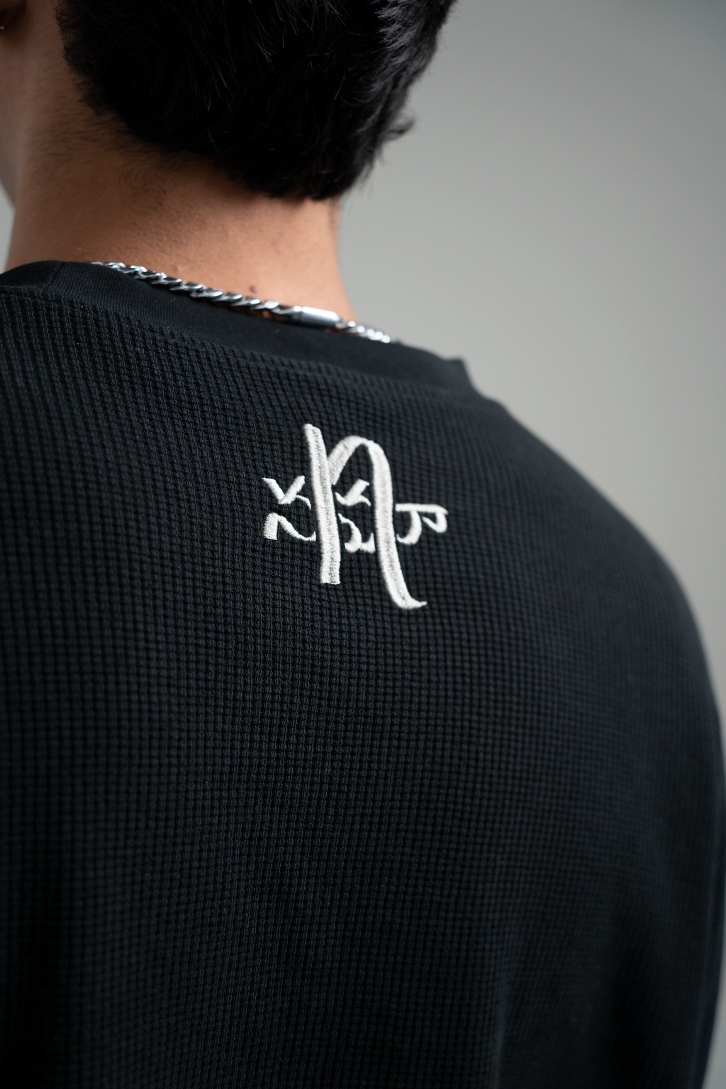 “rātri” waffle knit long sleeve