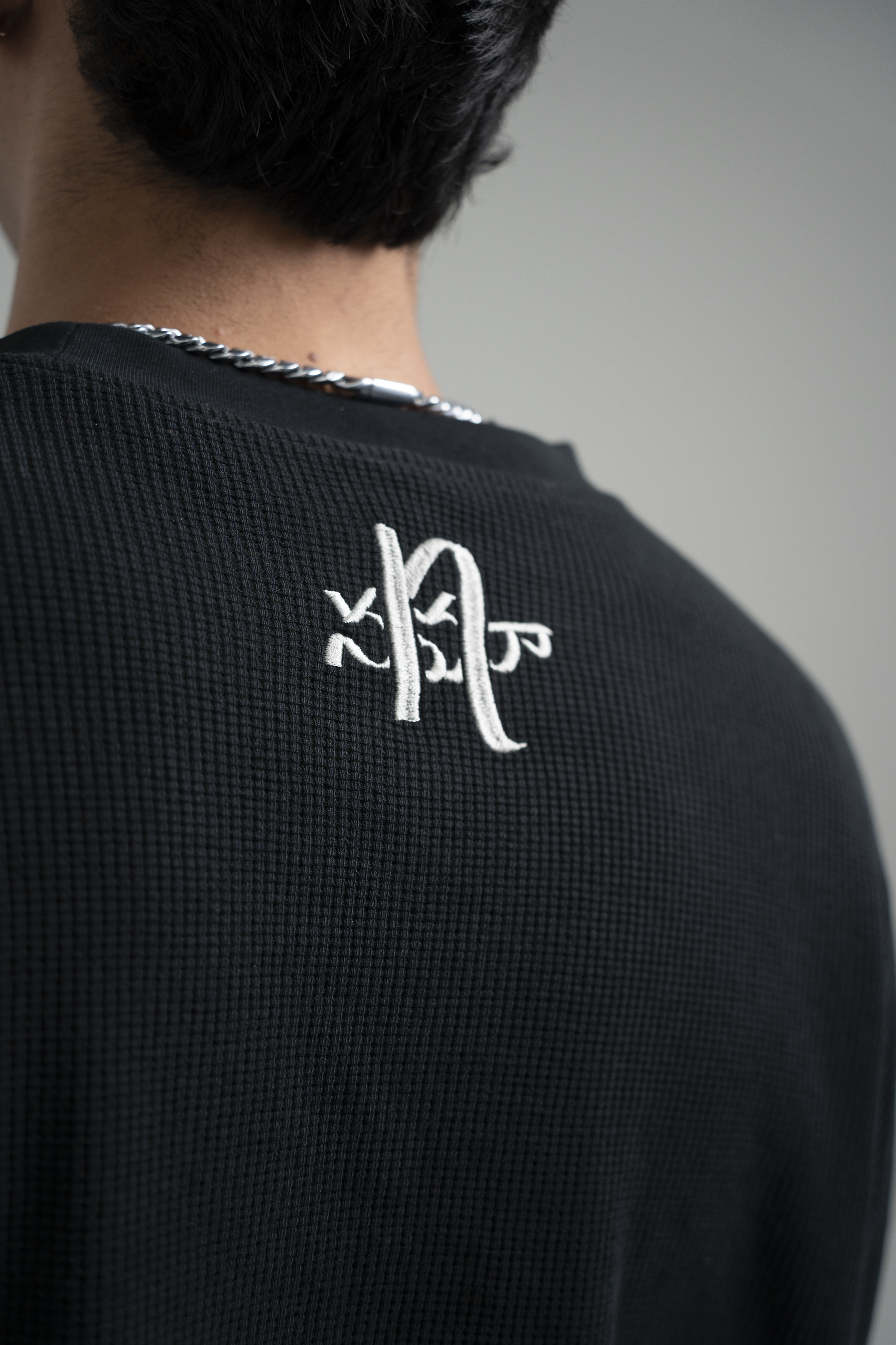 “rātri” waffle knit long sleeve